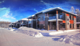 Nordic Village Condominium Resort in Winter - Colorful Royalty-Free Stock Images and Animations at Budget Price