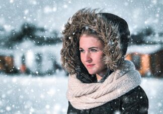 Beautfiful Woman in Winter Snowfall - Colorful Royalty-Free Stock Images and Animations at Budget Price